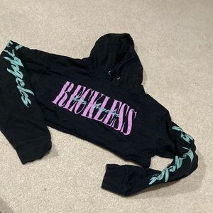 Young and Reckless crop hoodie.